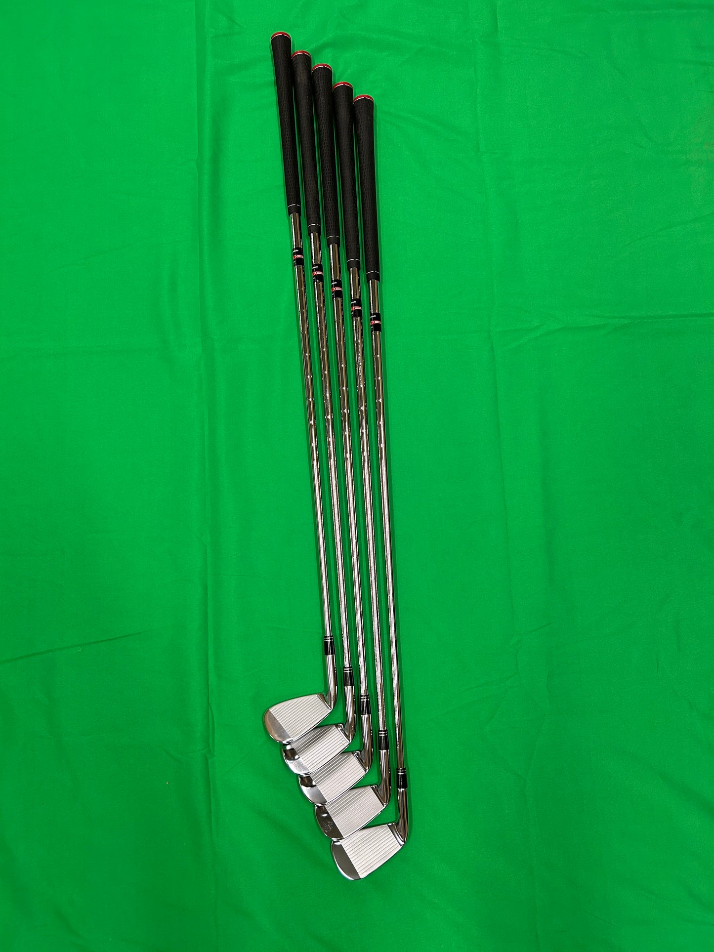 TaylorMade R9 irons 5,7,8,9,PW NSPro 950 steel stiff flex