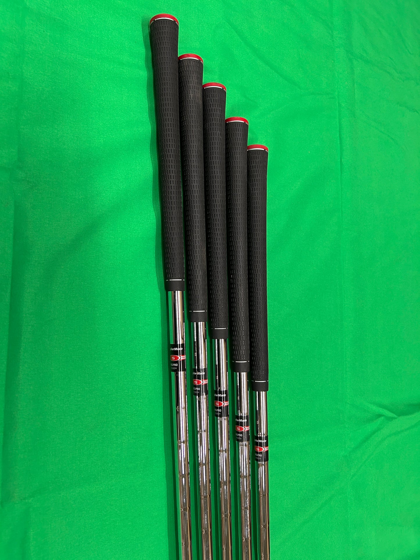 TaylorMade R9 irons 5,7,8,9,PW NSPro 950 steel stiff flex
