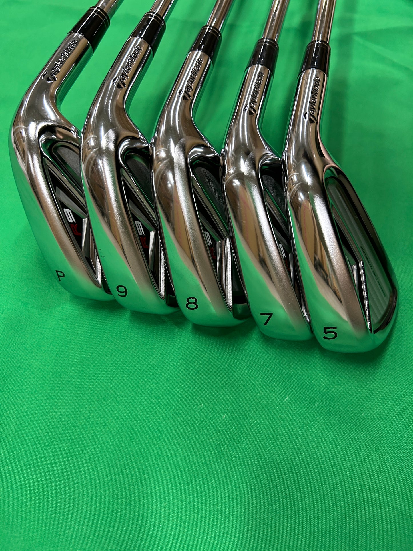 TaylorMade R9 irons 5,7,8,9,PW NSPro 950 steel stiff flex