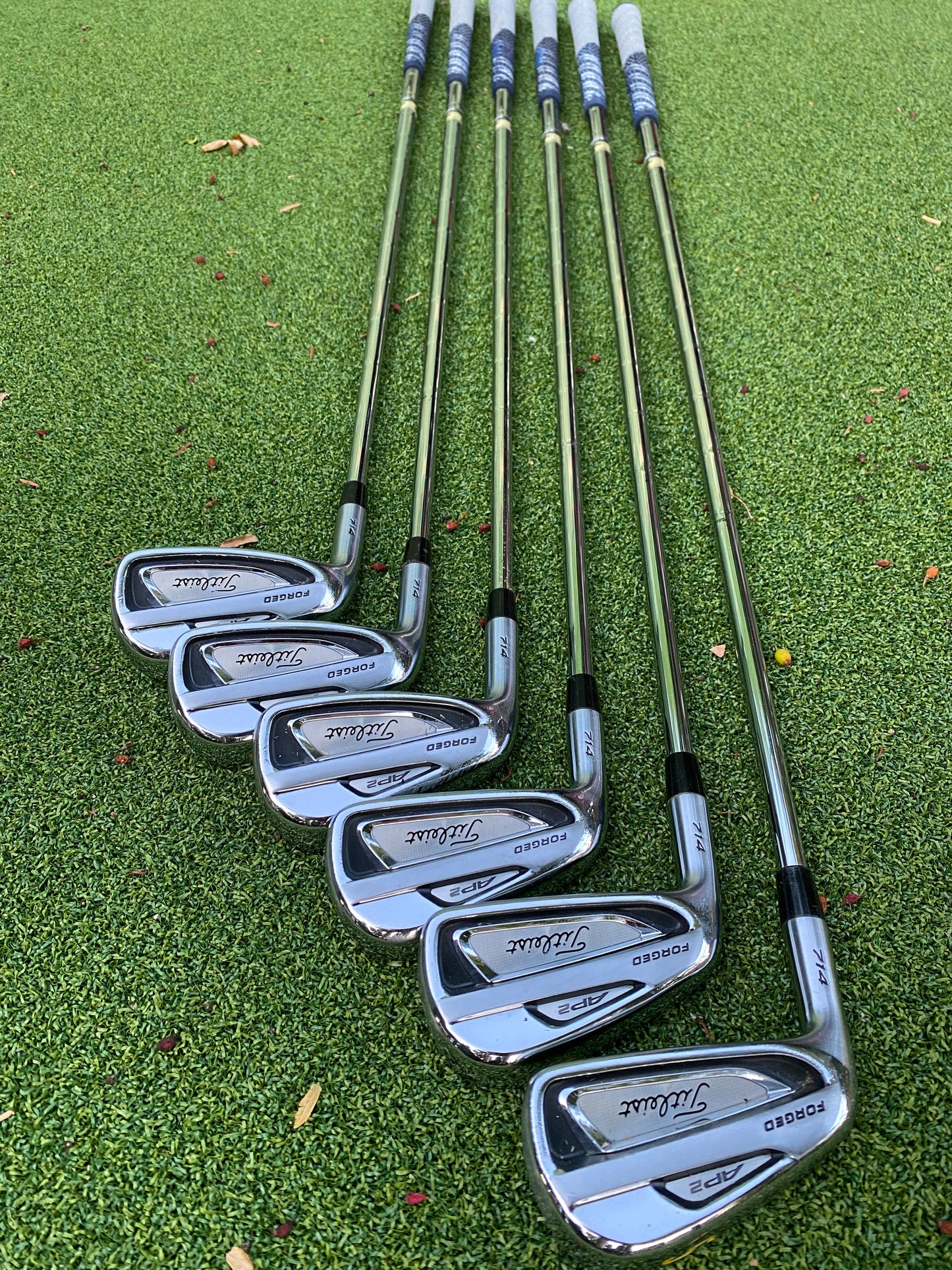 Titleist 714 AP2 left-handed irons 5-P DGX100 steel extra stiff flex